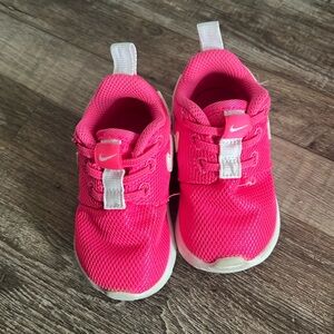 Pink Nike shoes size 4